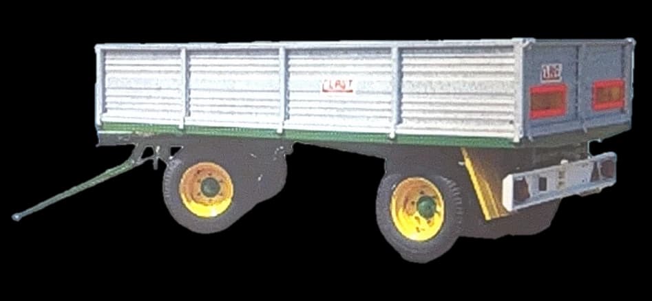 Rimorchio fisso 40F visto di tre quarti da dietro, sponde zincate, fanali posteriori e cerchi delle ruote gialli